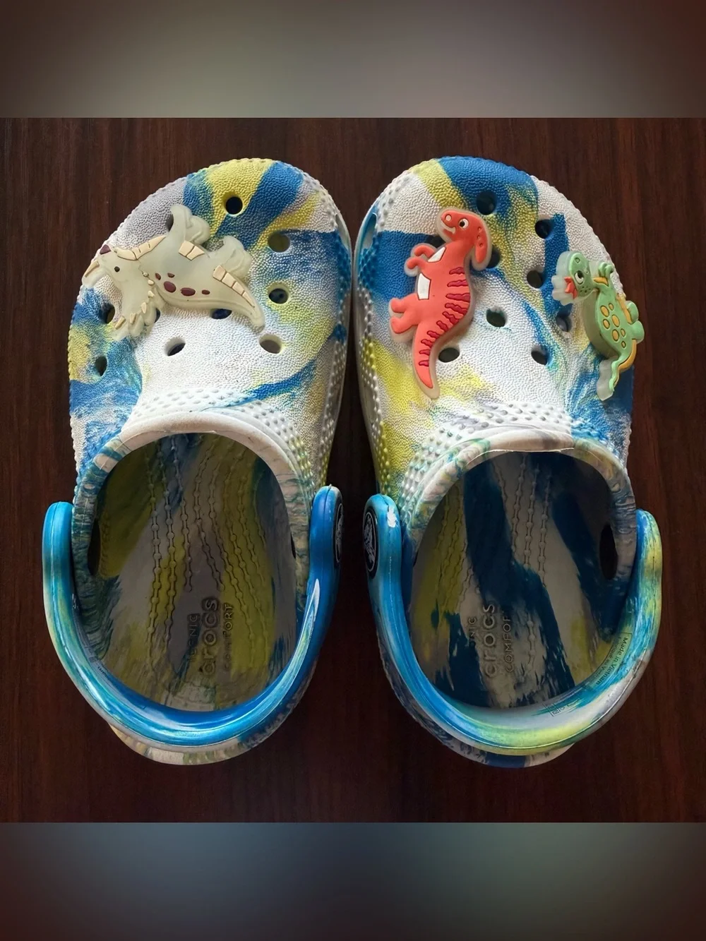 CROCS Size 6 Tie-Dye Clogs with Dino Charms